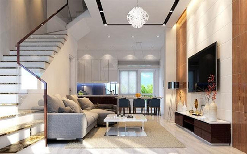 alt text:  Nội thất phòng khách hiện đại với sofa, bàn trà và kệ tivi thiết kế đơn giản, tinh tế