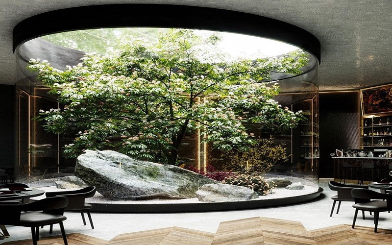 Thiết kế thân giếng trời với cây xanh