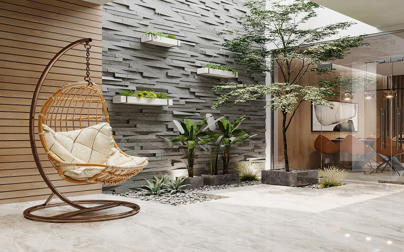 Trang trí đáy giếng trời với cây xanh và sỏi